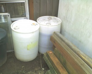 Umm...the 30 gallon barrels that came with the oil. Not nearly enough to hold it all, but a start...